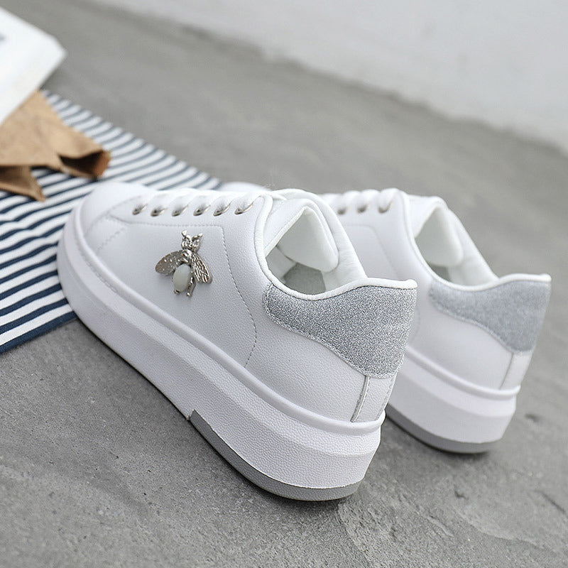 White trainers sales with bees